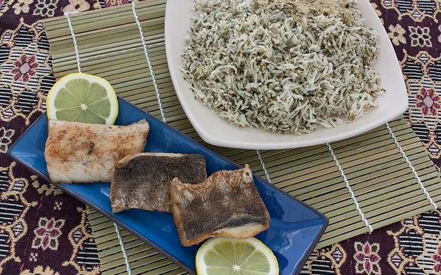 Sabzi polo ba mahi (herb rice with fish)