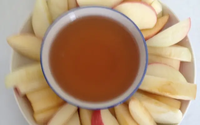 Apples dipped in honey